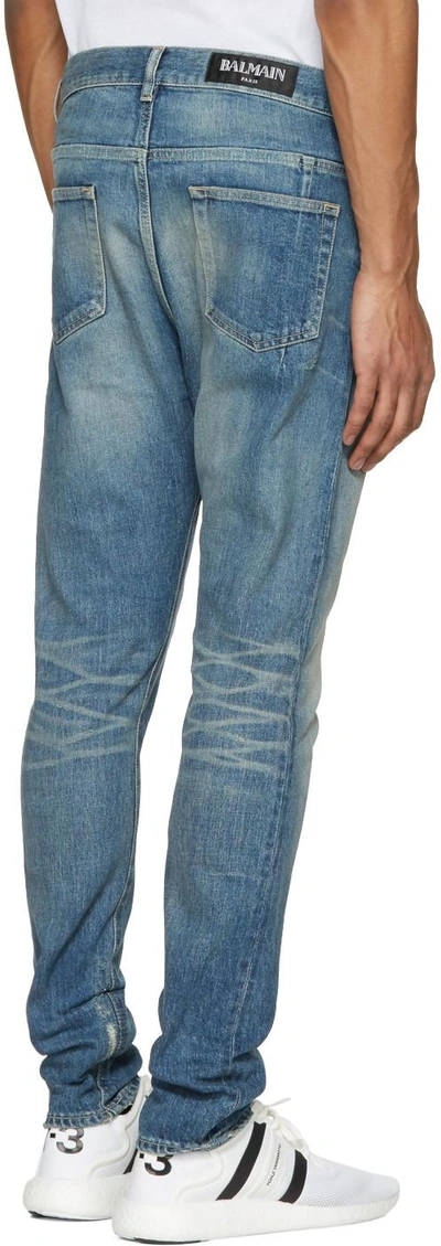 Shop Balmain Blue Distressed Low-rise Jeans