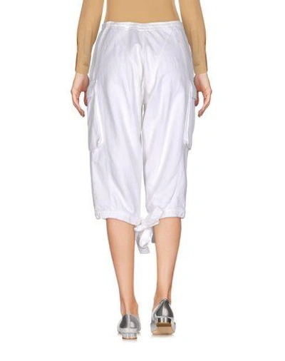 Shop Ermanno Scervino Cropped Pants & Culottes In White