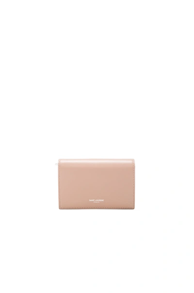 Saint Laurent Large Fragments Flap Wallet In Neutrals, Pink. In Nude Pink