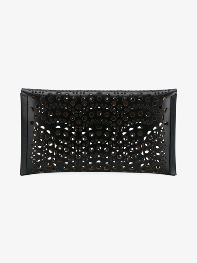 Shop Alaïa Ladies Black Leather Laser Cut Clutch Bag