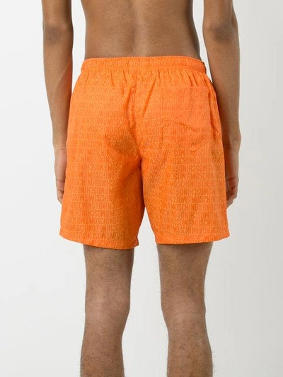 Shop Moschino Logo Print Swim Shorts