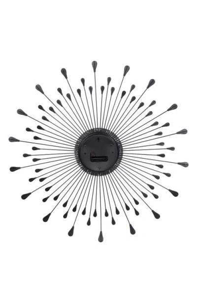 Ginger Birch Studio Sunray Wall Clock In Silver
