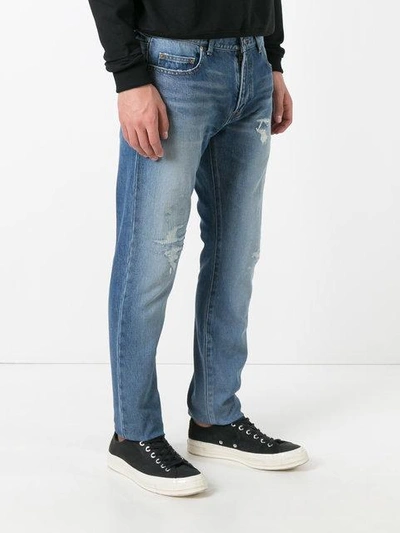 Shop Saint Laurent Classic Distressed Jeans In Blue