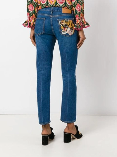 Shop Gucci Embroidered Jeans