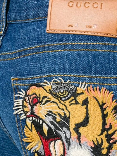 Shop Gucci Embroidered Jeans