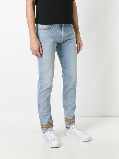 Shop Palm Angels Gold-tone Piping Skinny Jeans - Blue