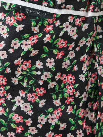 Shop Moncler Floral Print Cropped Trousers - Black