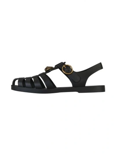 Shop Gucci Rubber Buckle Strap Sandal In Black