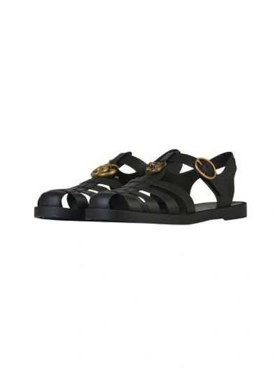 Shop Gucci Rubber Buckle Strap Sandal In Black