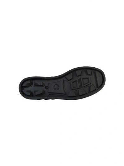 Shop Gucci Rubber Buckle Strap Sandal In Black