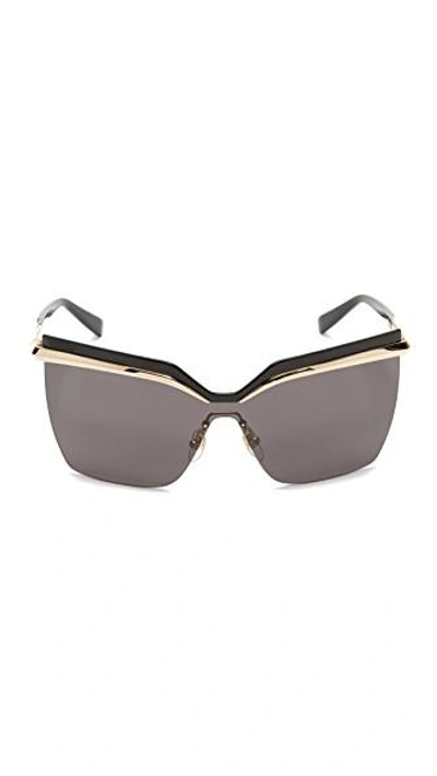 Shop Mcm Shield Sunglasses In Gold/black