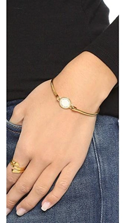 Shop Marc Jacobs Enamel Logo Disc Hinge Bracelet In Cream