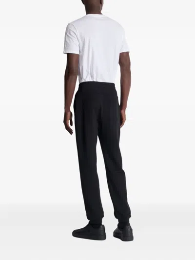 Balmain Logo Printed Elasticated Waistband Track Pants In Black