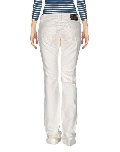 Shop Pinko Denim Pants In White