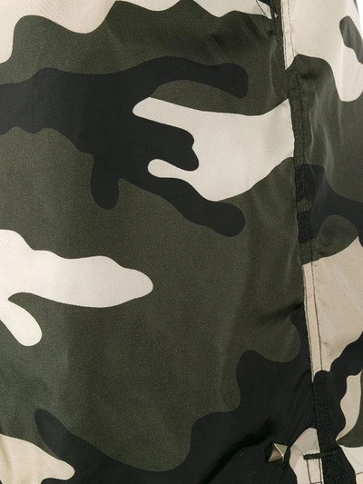 Shop Valentino Rockstud Camouflage Swim Shorts