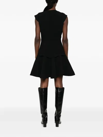 Sandro Paris Structured Buttoned Mini Dress In Black