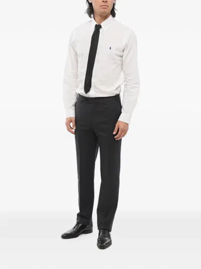 Corneliani Pressed-crease Trousers In Black