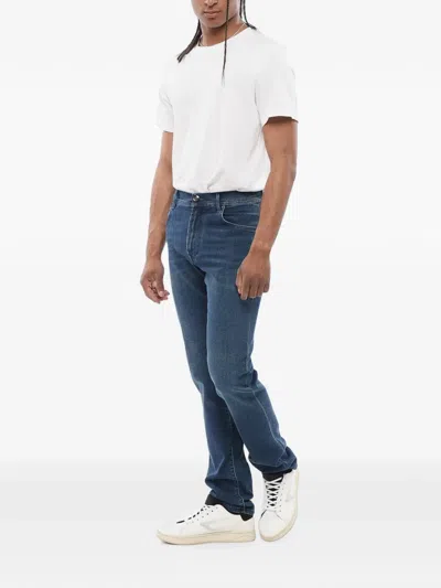 Corneliani Logo-embroidered Washed Jeans In Blue