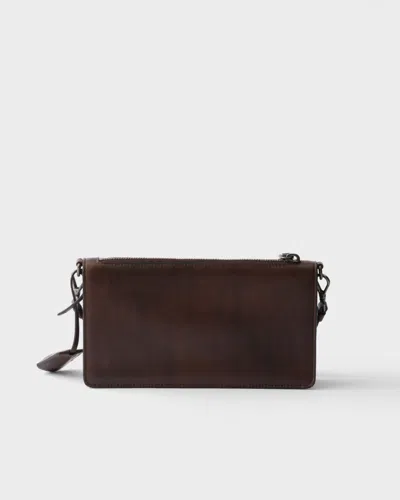 Prada Mini Rectangular Leather Pouch Handbag With Detachable Shoulder Strap In Brown