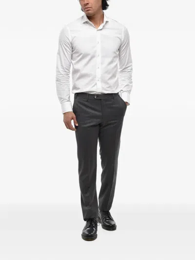Corneliani Pinstripe-pattern Trousers In Black