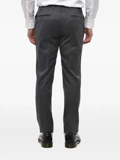 Corneliani Pinstripe-pattern Trousers In Black