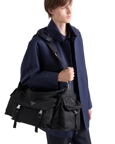 Prada Explore Re-nylon And Leather Duffel Bag In Black