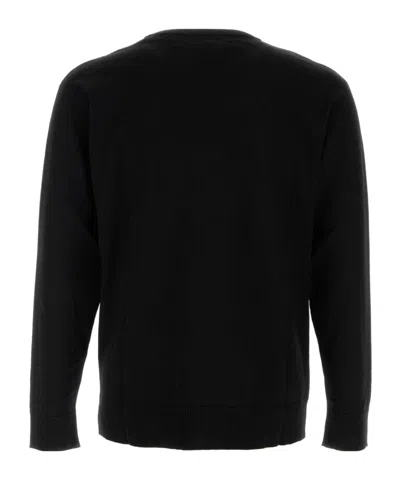 Moschino Virgin Wool Ribbed Crewneck Long-sleeve T-shirt In Black