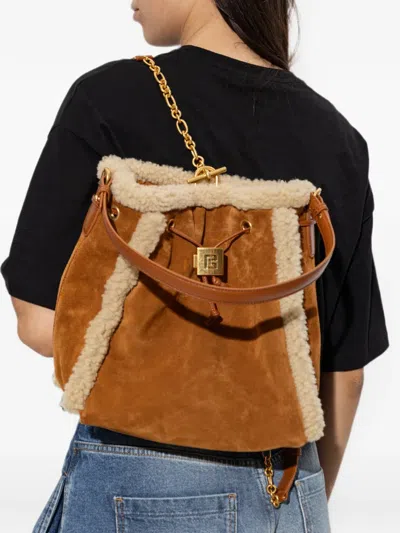 SHEARLING-TRIM LEATHER BACKPACK