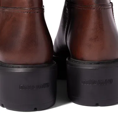 Miu Miu Logo Leather Boots In Brown