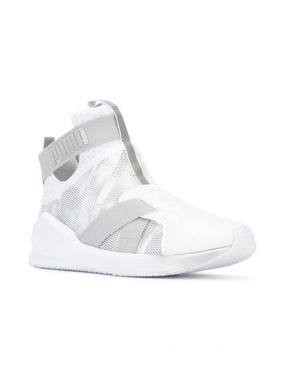 Shop Puma Fierce Strap Swan Sneakers