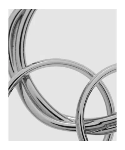Jil Sander Engraved-logo Twisted-effect Keyring In Metallic