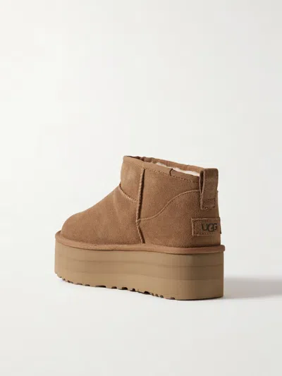 Ugg Mini Platform Shearling Boots In Brown