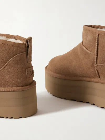 Ugg Mini Platform Shearling Boots In Brown