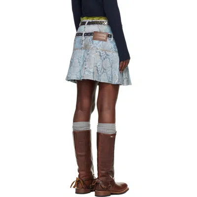 Andersson Bell Python Print Faded Denim Mini Skirt In Blue