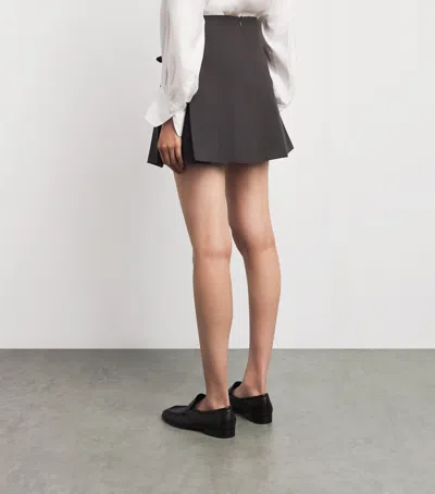 Sandro Paris Side-bow Pleated Mini Skirt In Multi