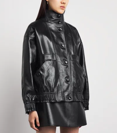 Sandro Paris Oversized Glossy Leather Jacket In Black