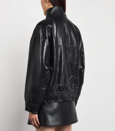 Sandro Paris Oversized Glossy Leather Jacket In Black