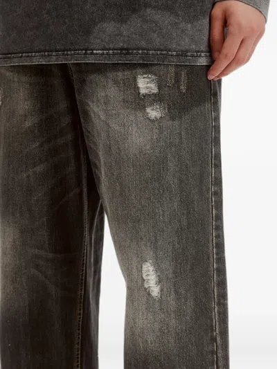 Five Cm Distressed Whiskered Jeans In Black