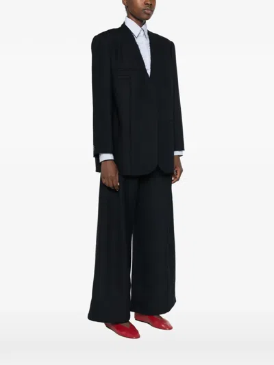 Eleh Frayed-edge Jacket In Black