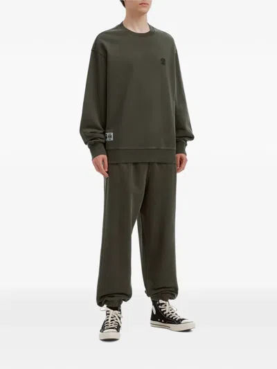 Fingercroxx Logo-patch Drawstring Track Pants In Multi