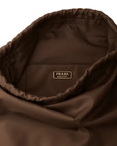 Prada Re-nylon Drawstring Bucket Bag In Sienna