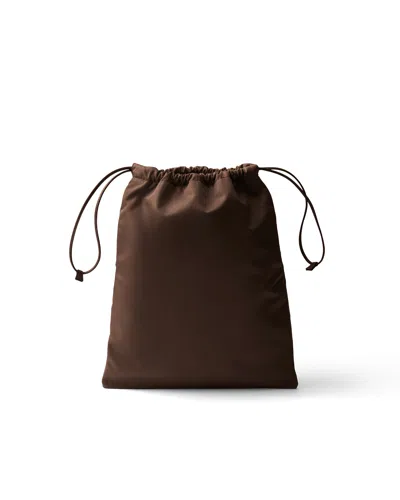 Prada Re-nylon Drawstring Bucket Bag In Sienna
