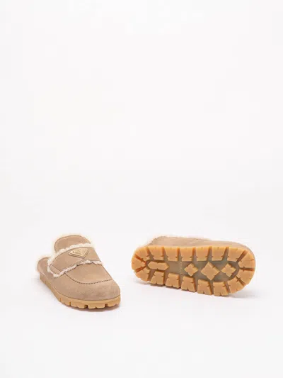 Prada Suede And Shearling Mules In Neutral