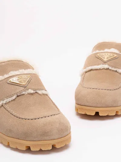 Prada Suede And Shearling Mules In Neutral