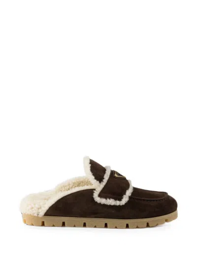 Prada Shearling-trim Logo-plaque Suede Mules In Brown