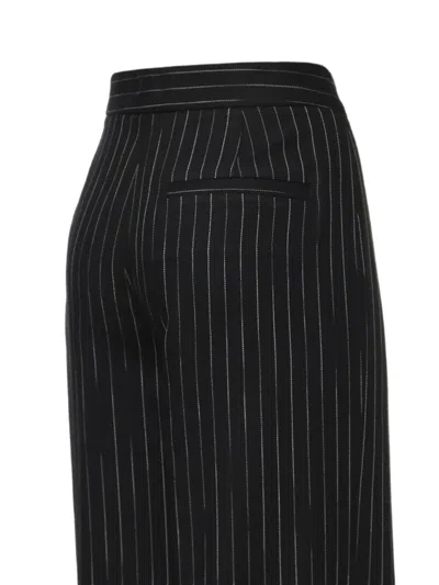 Genny Pinstripe-pattern Trousers In Black
