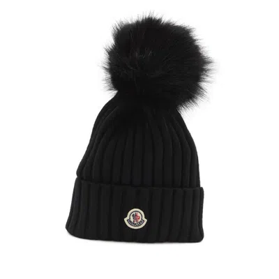 Moncler Ribbed Knit Wool Beanie With Faux Fur Pom-pom In Black