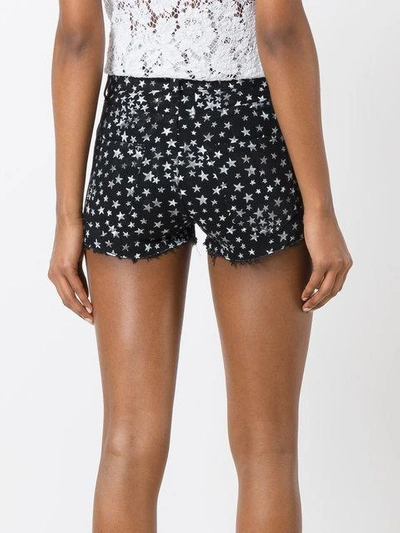 Shop Saint Laurent Jeansshorts Mit Sterne-print In Black