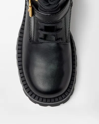 Versace Roxy Leather Boots 35 Mm In Black