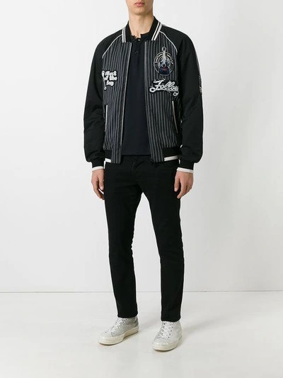 Shop Dolce & Gabbana Musical Patch Striped Bomber In Black